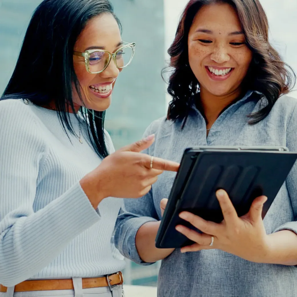 Tablet, partnership teamwork and happy people on balcony review social network, customer experience or business ecommerce. Brand monitoring data, talking and women teamwork on online survey feedback.