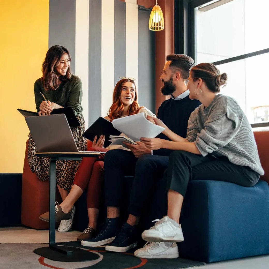 Businesspeople working in an office lobby