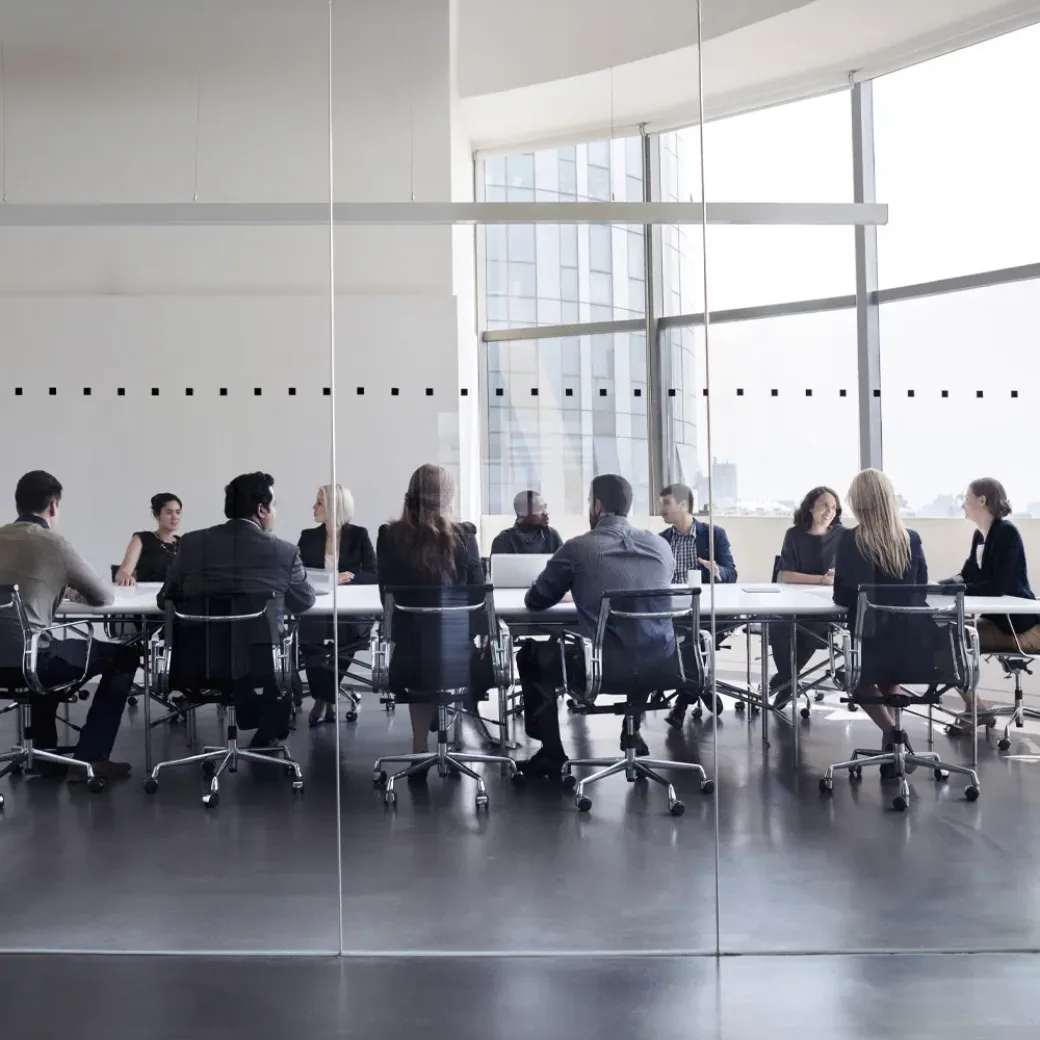 Colleagues at business meeting in conference room