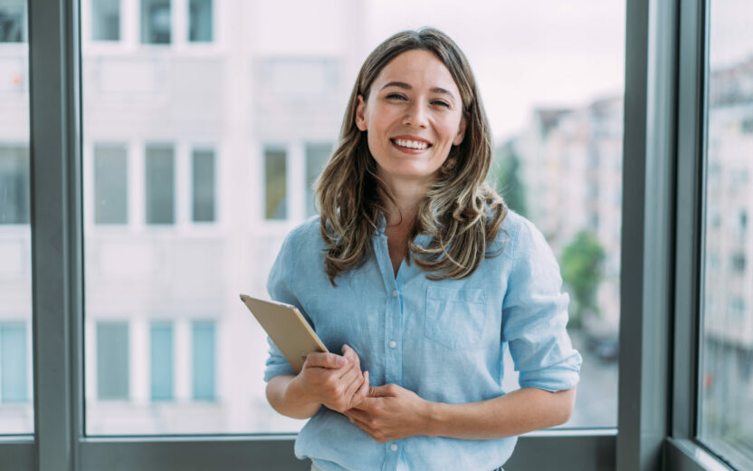 Confident businesswoman in modern office.