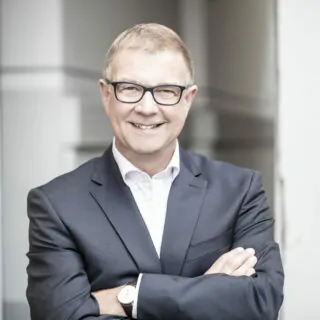 Retrato de Jürgen Brunner, IT Division Manager na Hochland