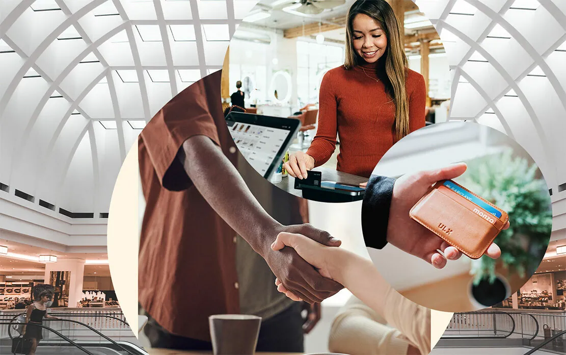 Two people shake hands, one woman pays with card