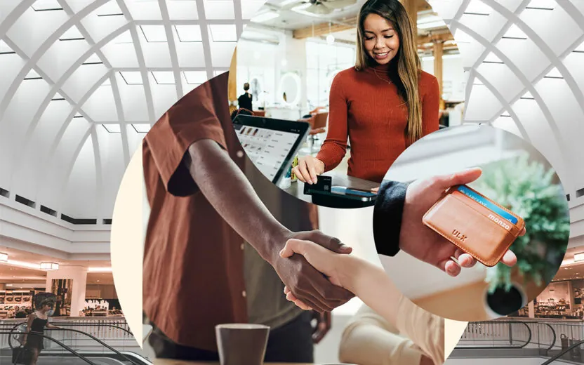 Two people shake hands, one woman pays with card