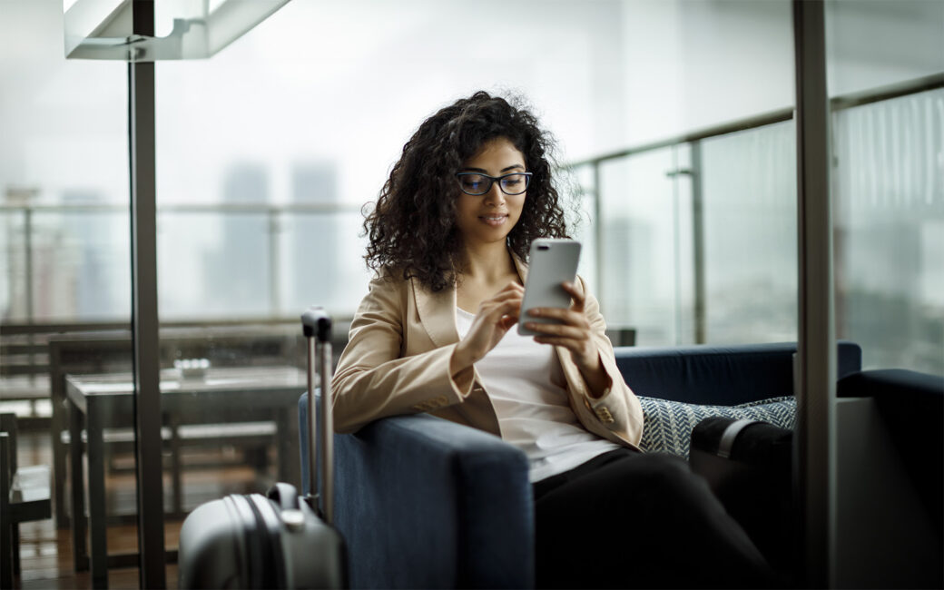 Young businesswoman using mobile phone