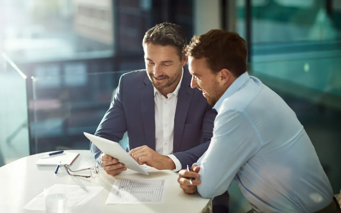 Cropped shot of two businessmen meeting in the office