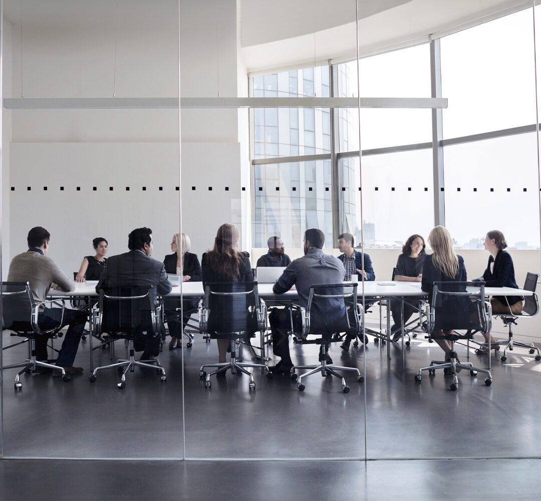 Colleagues at business meeting in conference room