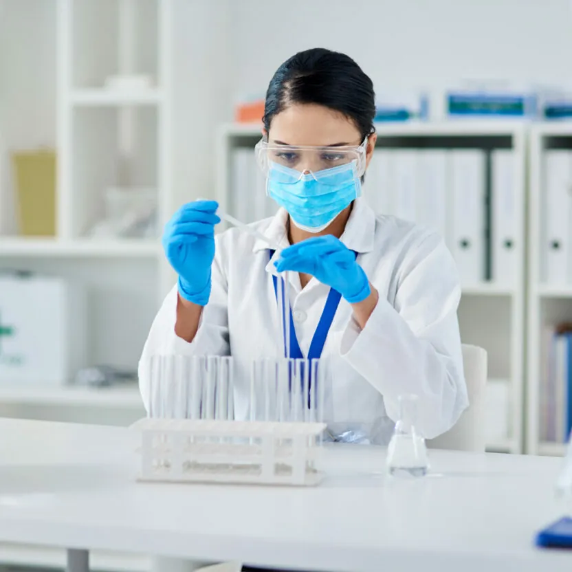 Shot of a young scientist conducting an experiment in a laboratory