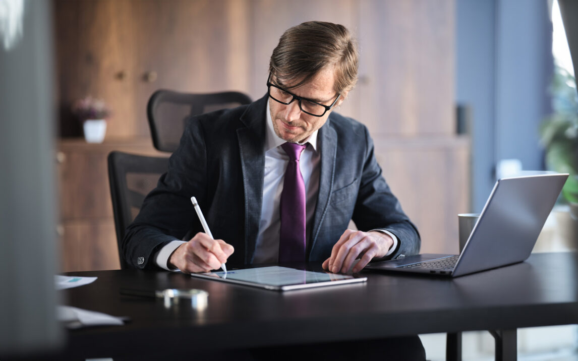 Businessman Signing Digital Contract