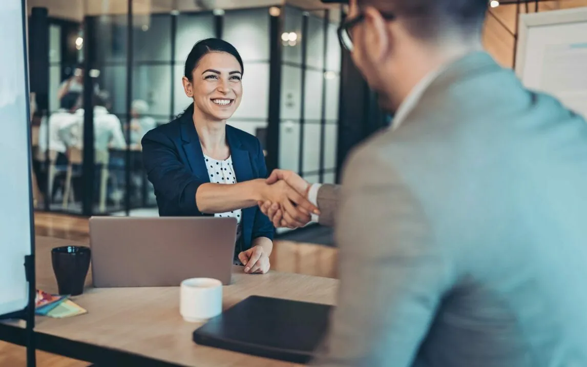 Business persons talking in the office