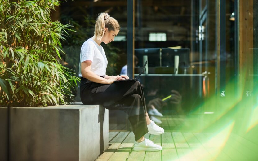 valantic employee working on laptop in Salzburg