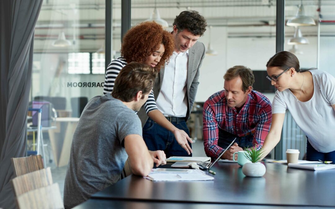 Shot of office workers in a meeting in a boardroom