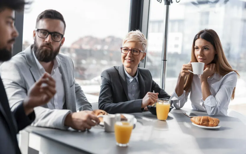Business people having Breakfast in an office