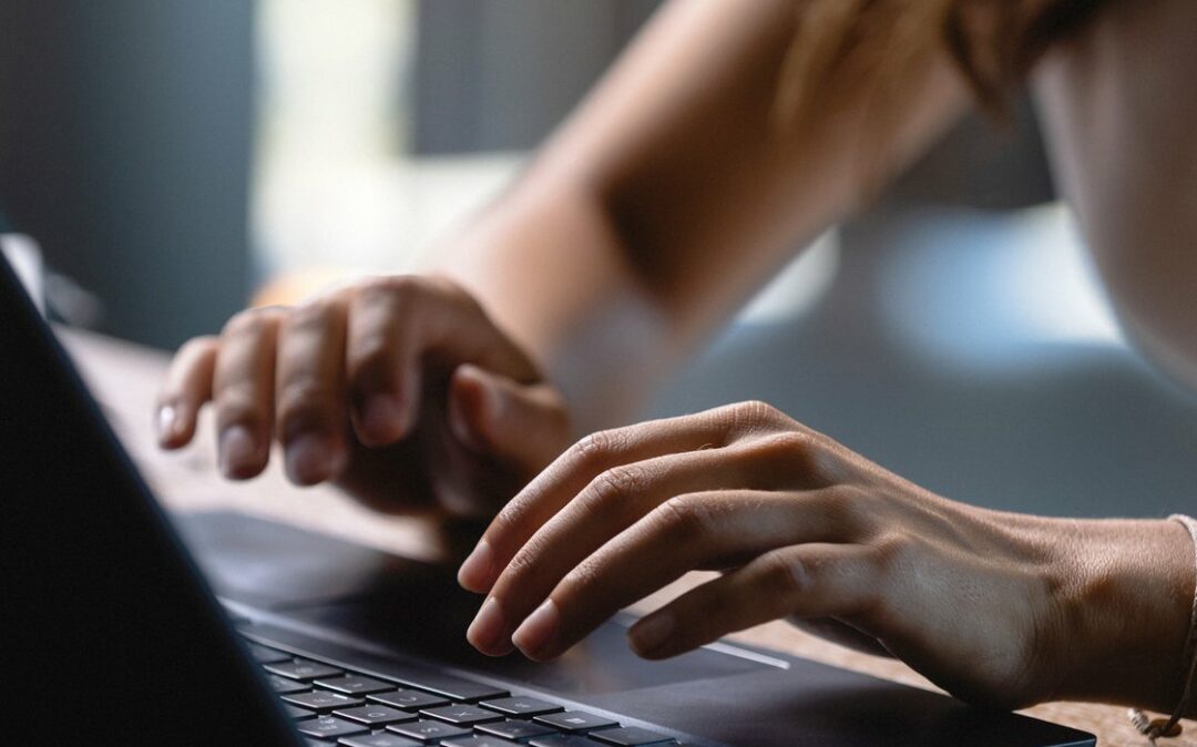 A woman at the laptop
