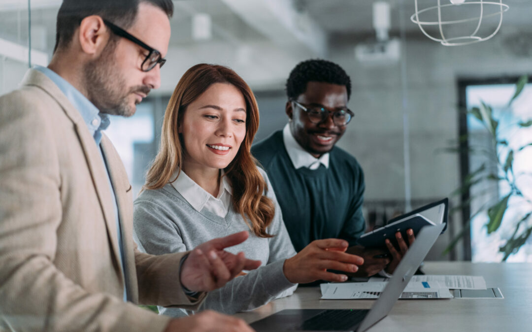 Business woman explaining business plan on laptop