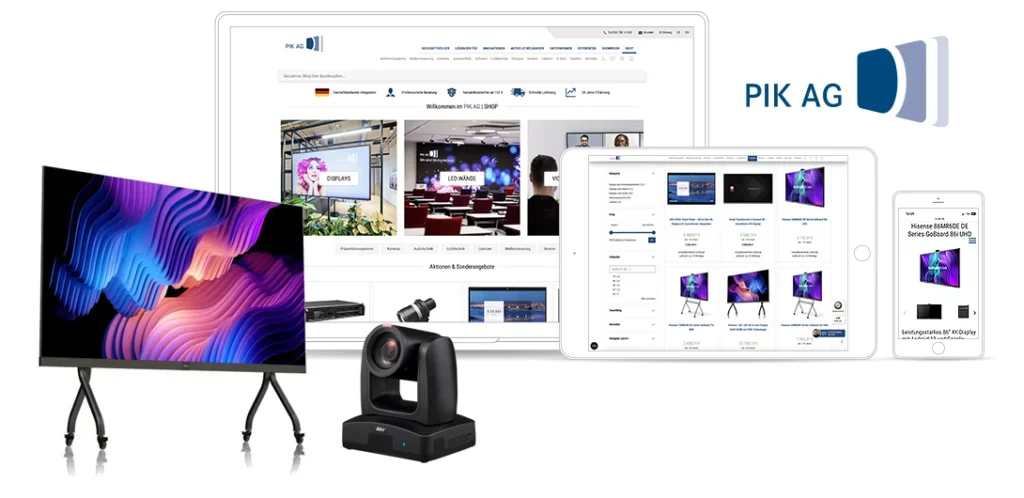 Tablet, Laptop und Smartphone mit B2B-Tech-Website, umgeben von Monitoren und Kamera.