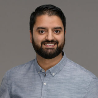 Dawinder Singh, Head of Data & Analytics & AI bei MEWA in a grey shirt
