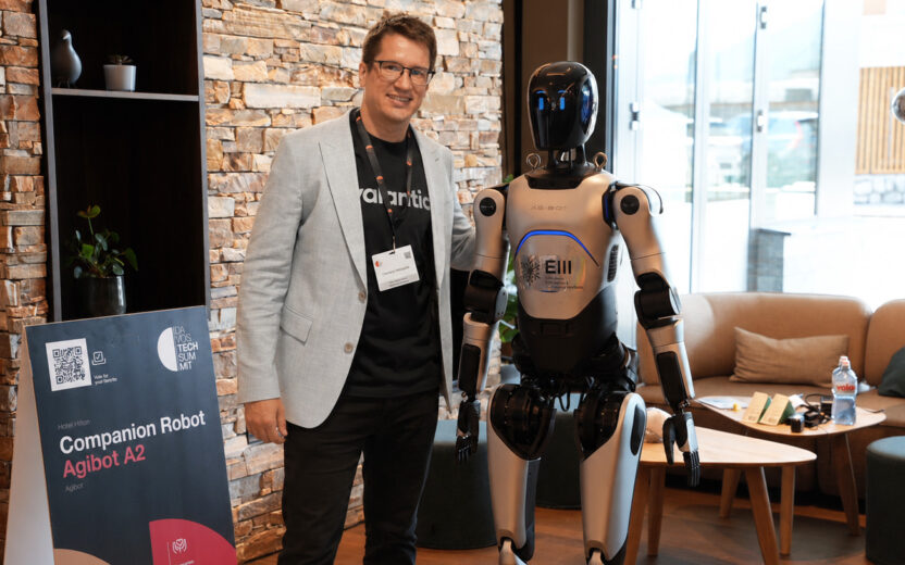 Clemens with Robot at Davos Tech Summit