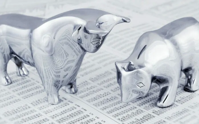 Image of two silver animal figures, icubic becomes valantic Trading Solutions