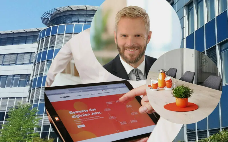 Image of Thomas Latajka, Managing Director at valantic ERP, office in Langenfeld, conference room, valantic website on a tablet computer