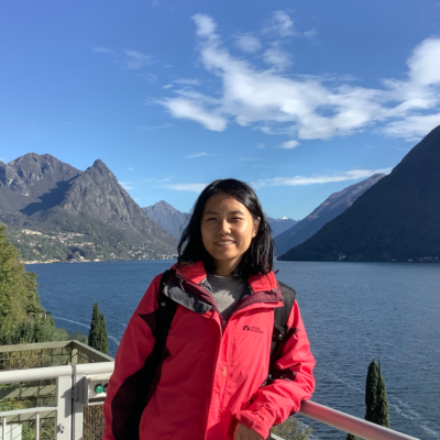 About us - Team - Picture of Cissy Hu, User Experience Specialist at valantic, with waters and mountains in the background