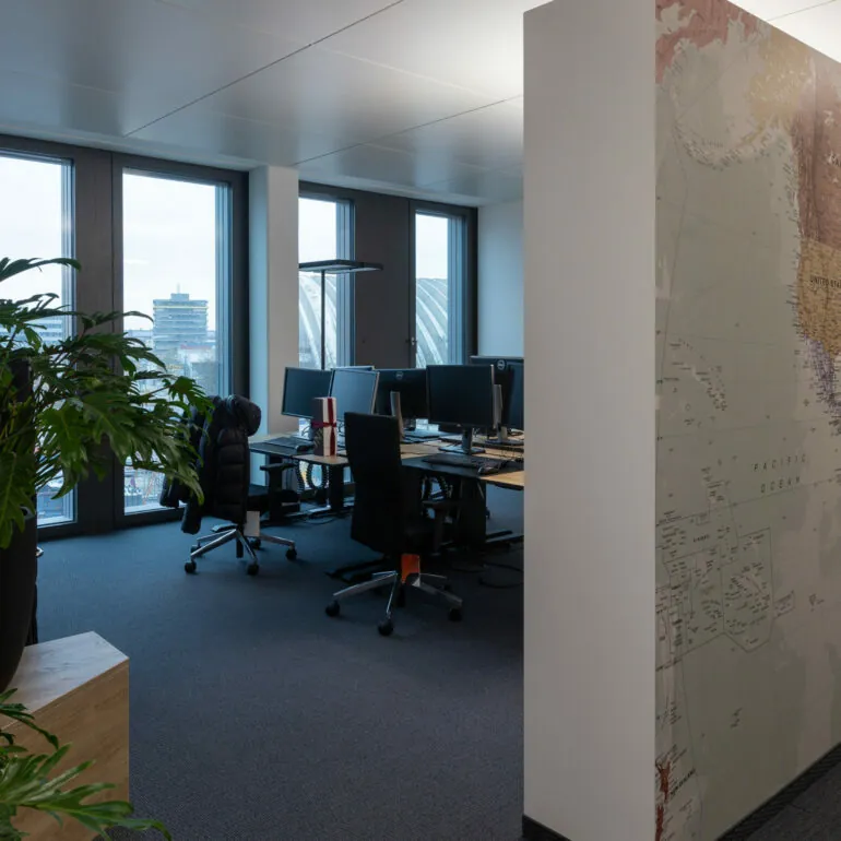 Picture of offices and world map, valantic branch Supply Chain Excellence Munich