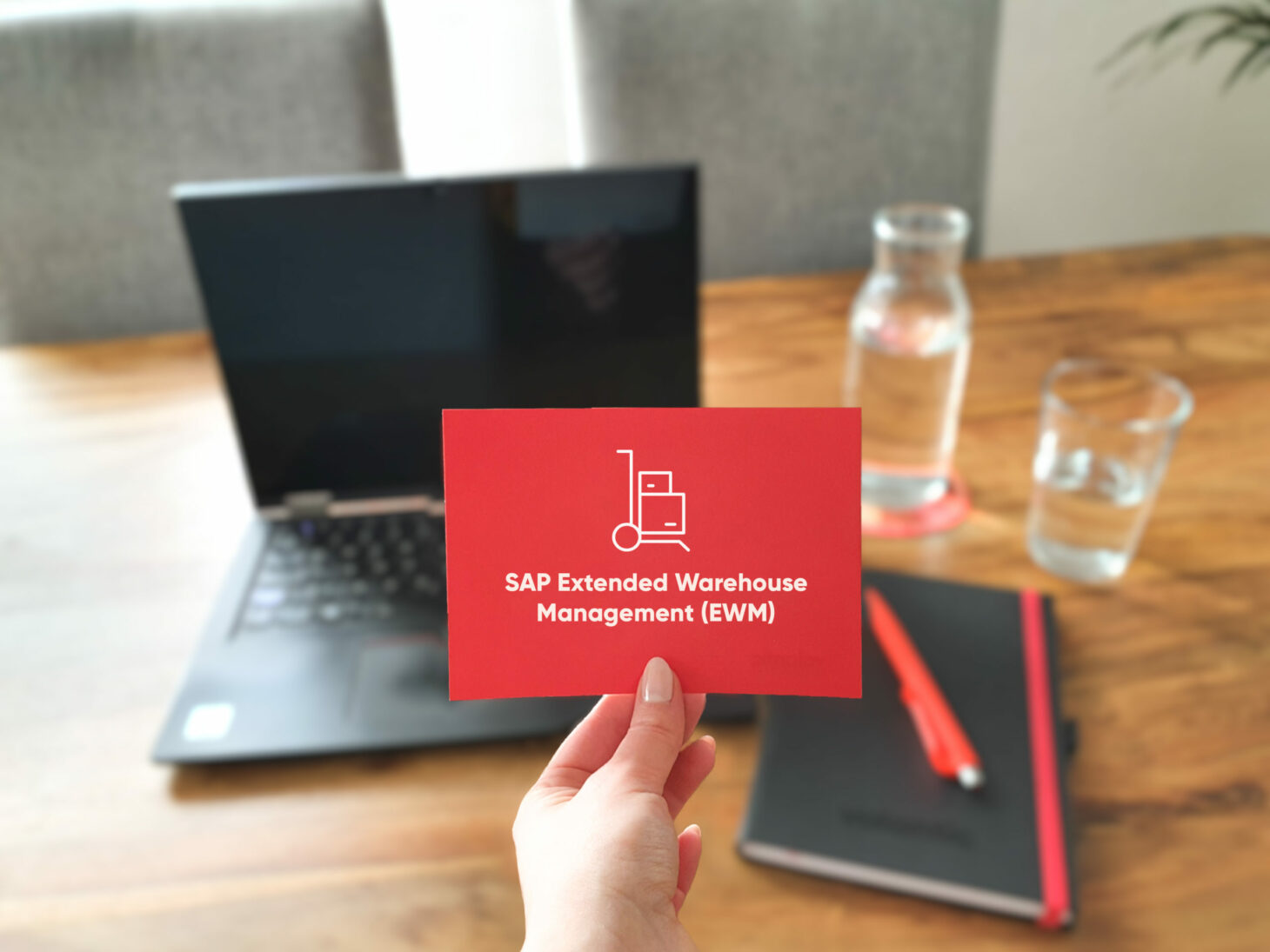 Image of a postcard with the heading SAP Extended Warehouse Management (EWM), SAP career at valantic