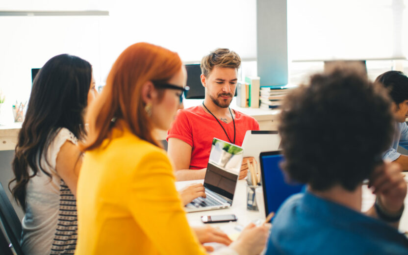 Start up team having a meeting in the office and planning a new project.