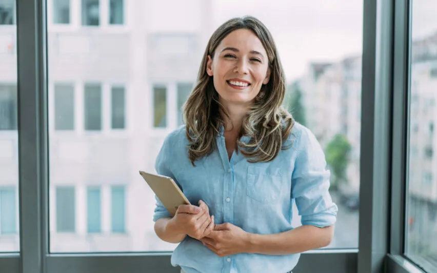 Confident businesswoman in modern office.