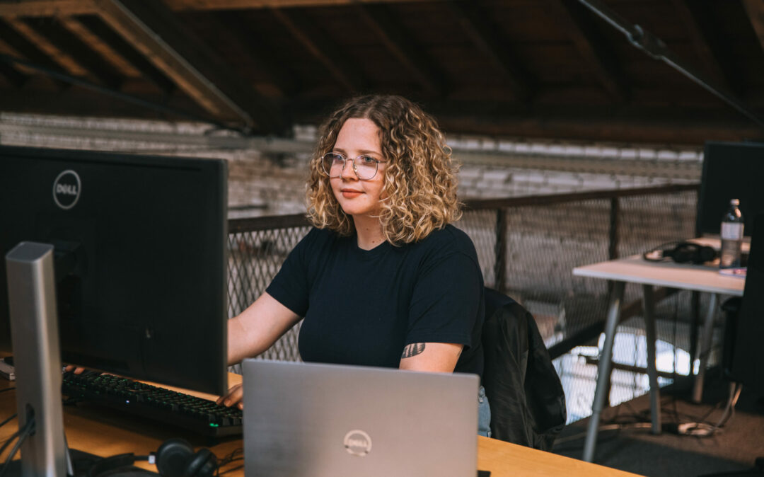 Employee working at a computer.
