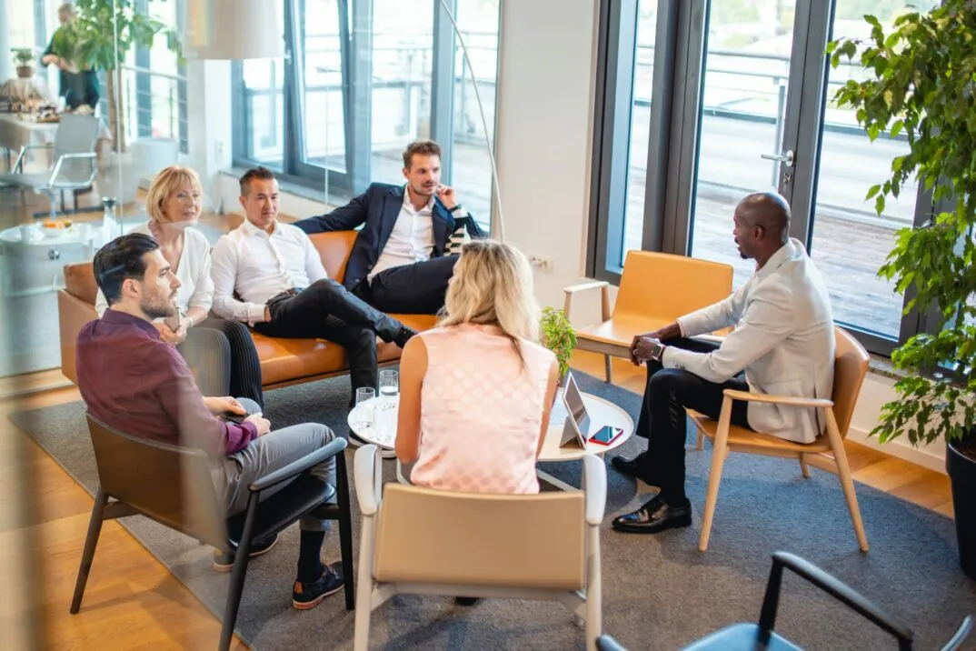 Picture of a group of people in a conversation situation