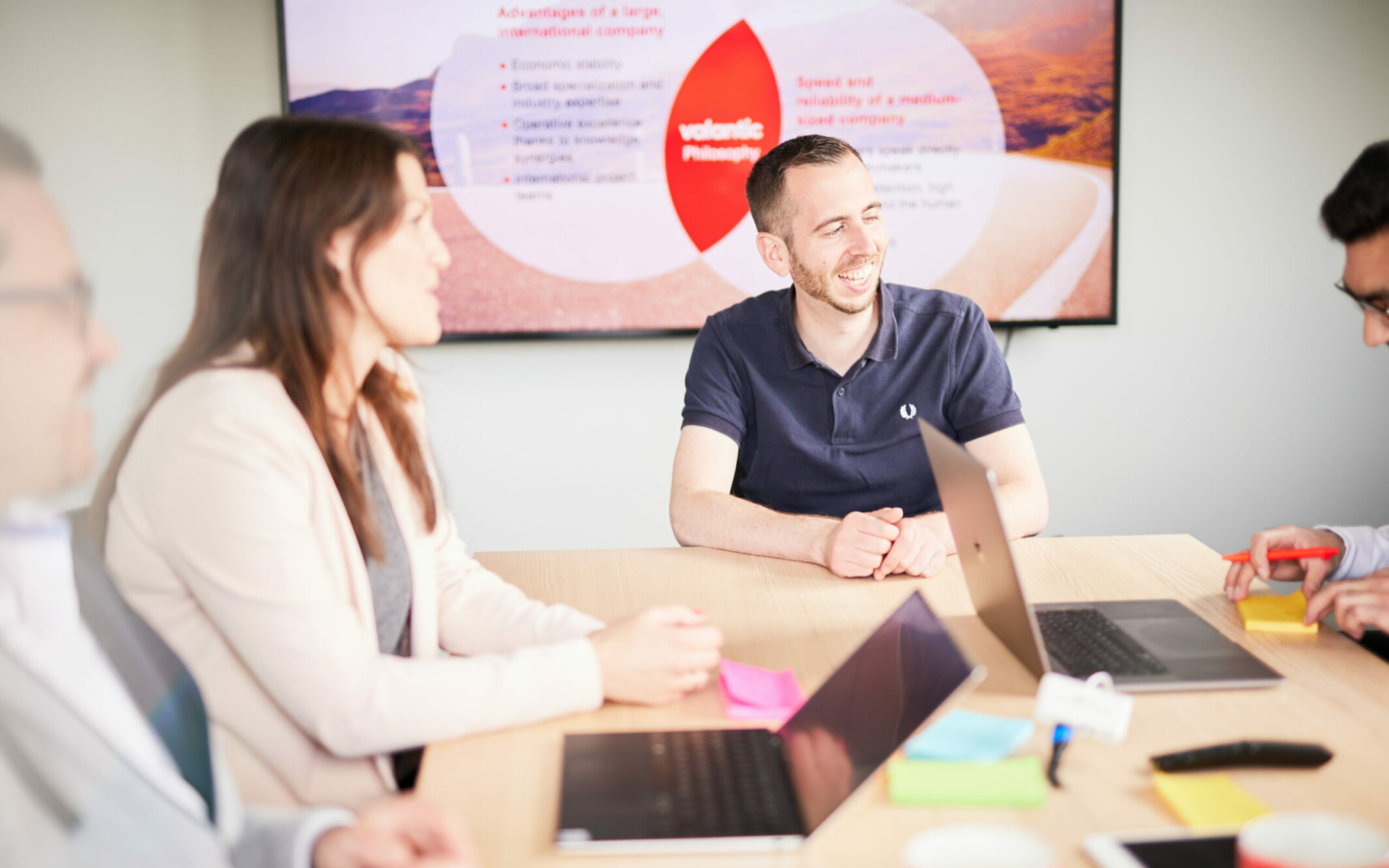 Photo of a meeting with several people.
