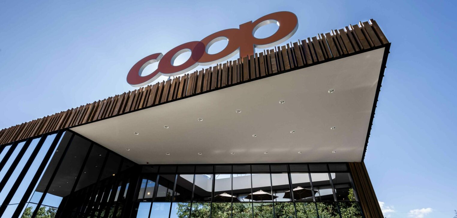 Image with the exterior view of a Coop supermarket, SAP Commerce