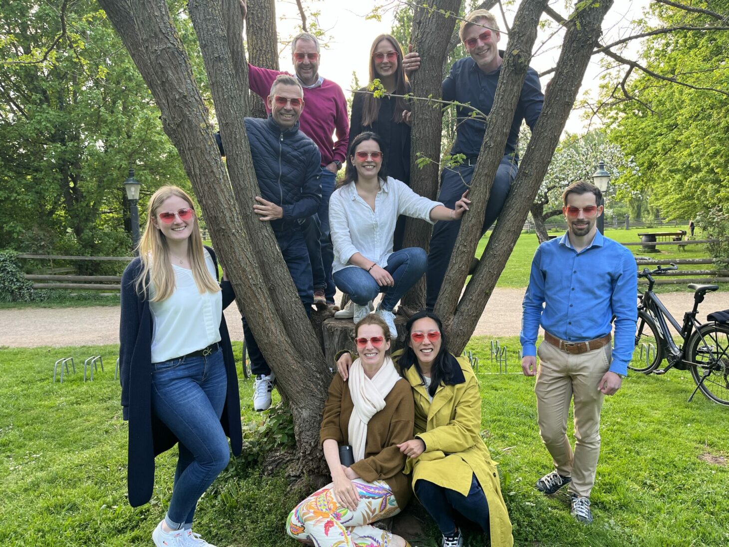 Group picture of valantic employees in the greenery, Management Consulting Career at valantic