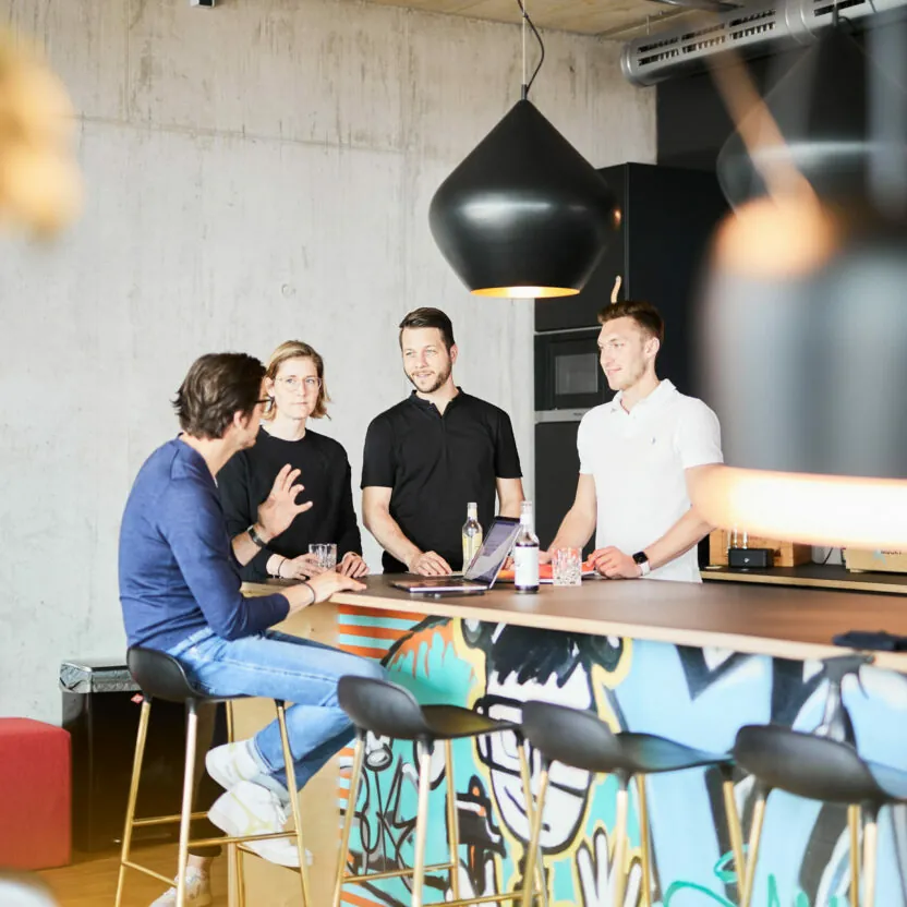 Photo of a happy valantic CX employee participating in a customer experience workshop.