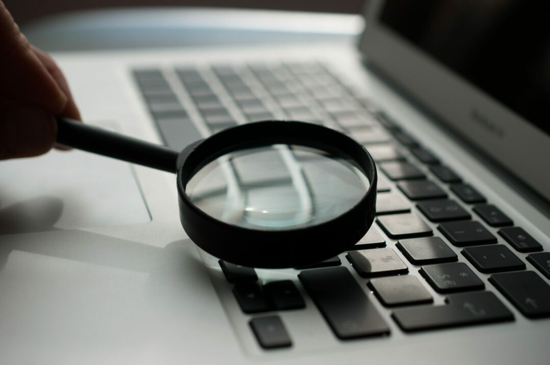 magnifying glass on a keyboard