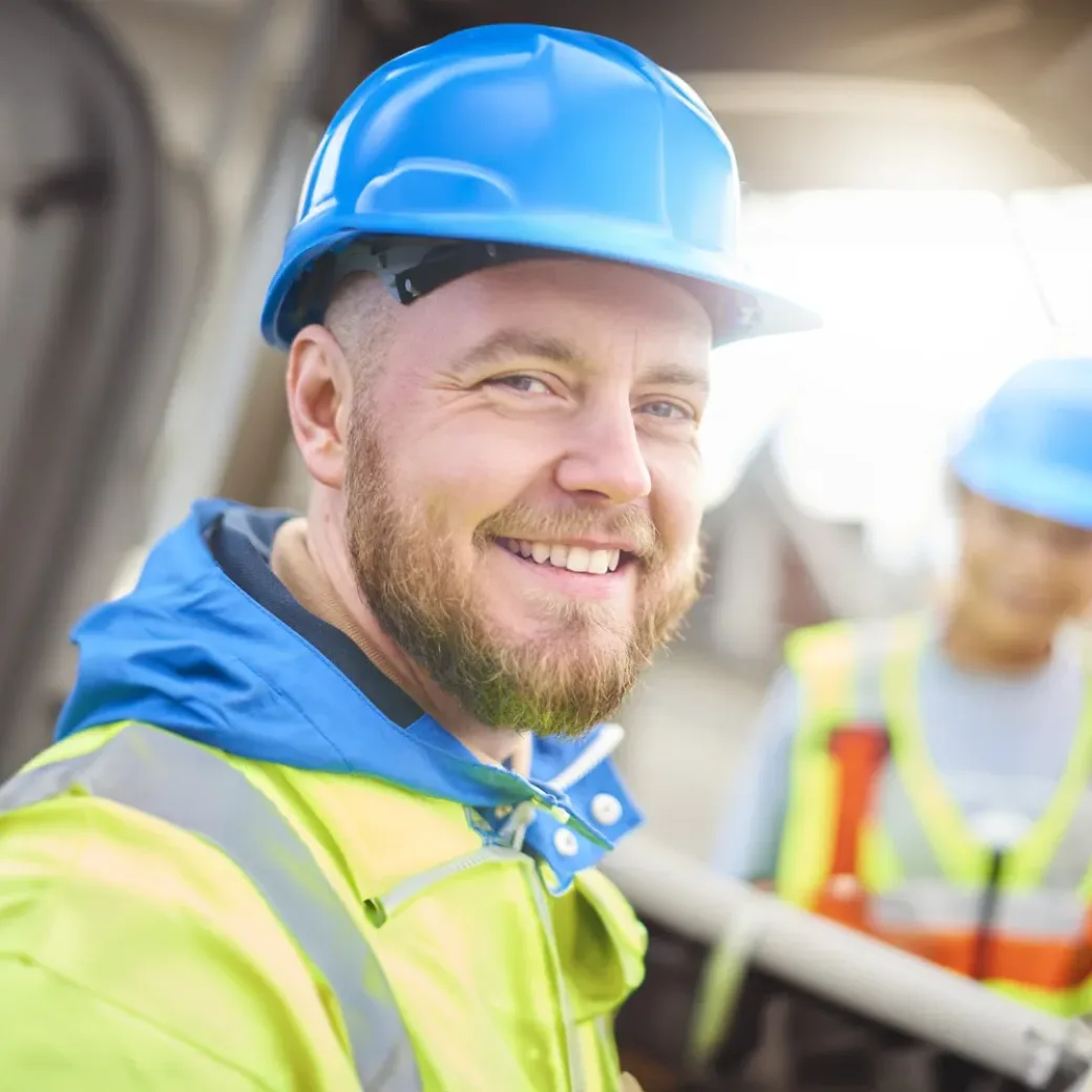 male site engineer poses for the camera