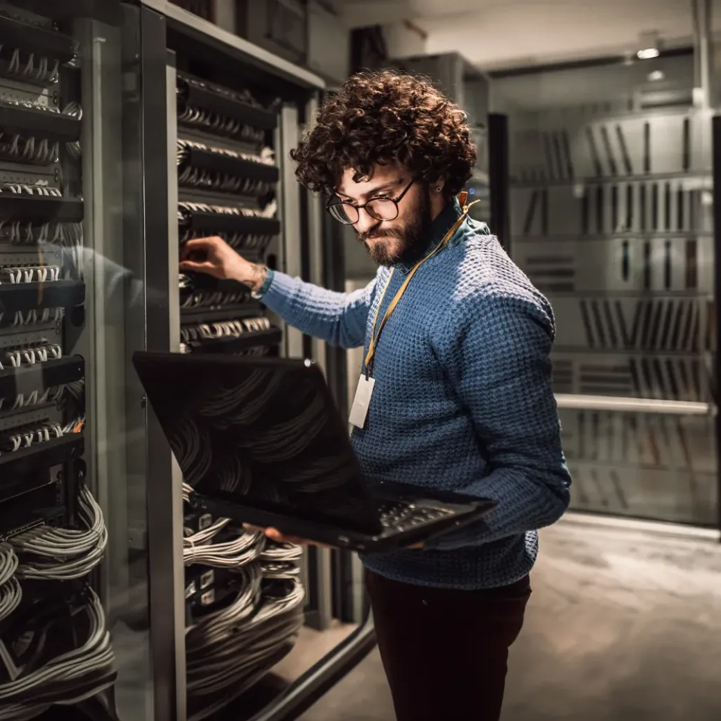 Man in a server room