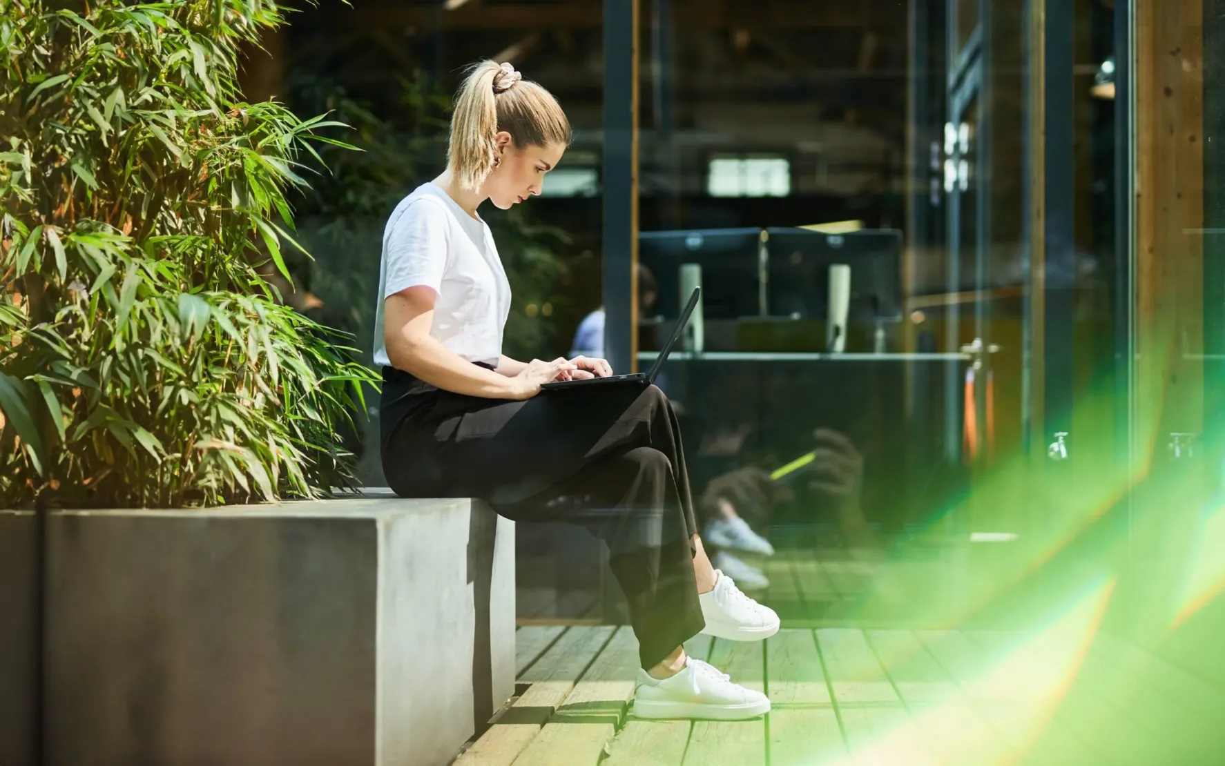 valantic employee working on laptop in Salzburg